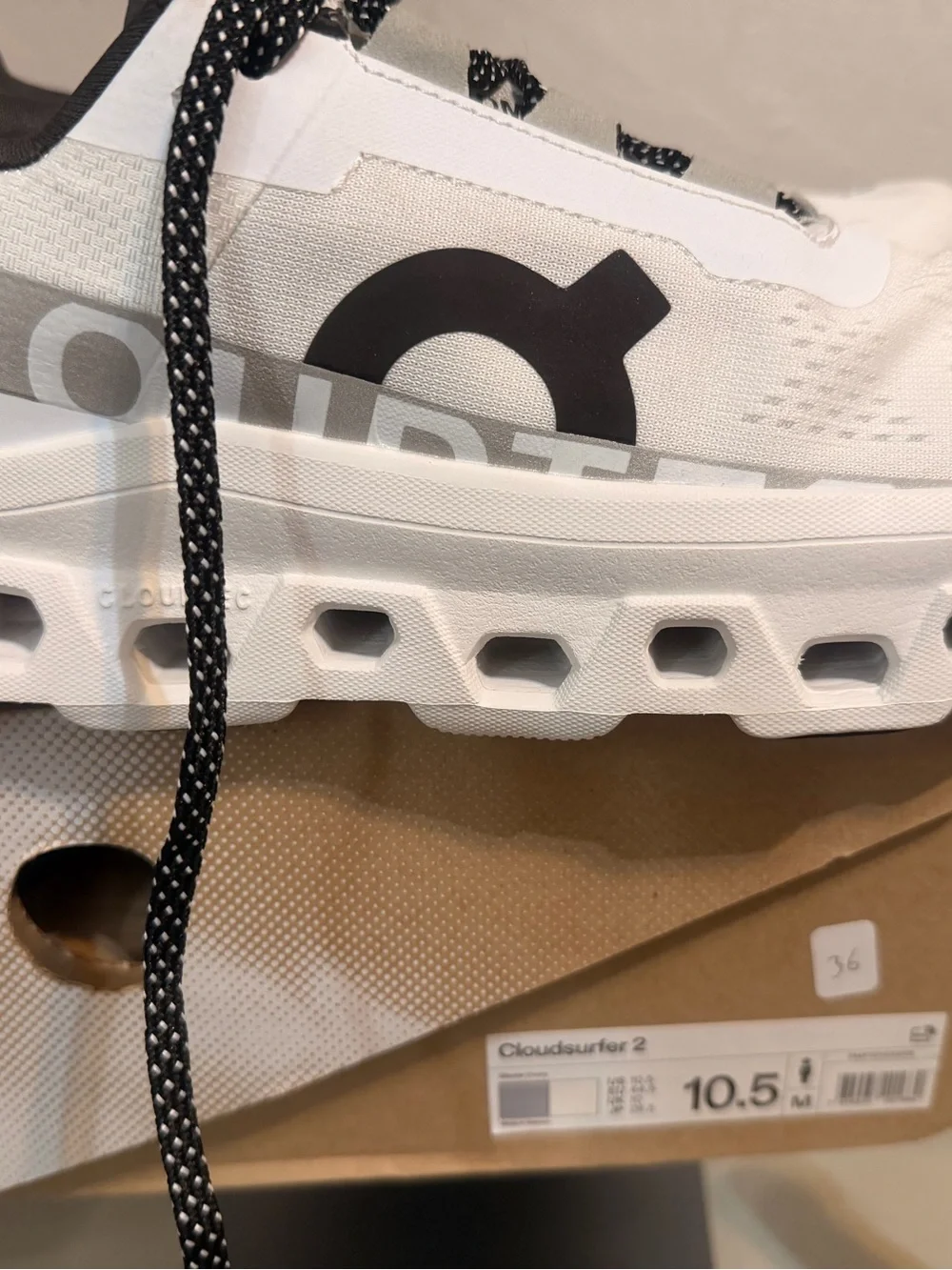 On Running White and Black CloudTec Sneakers